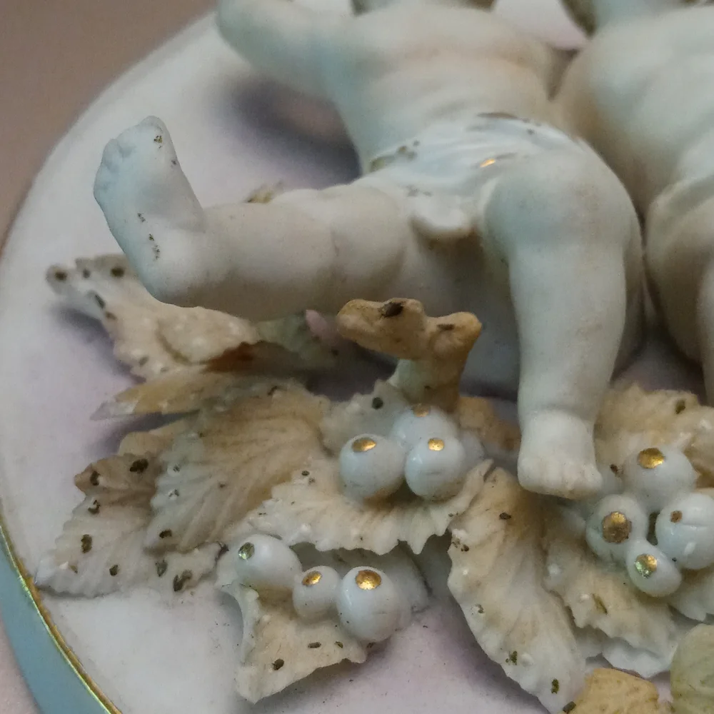 Antique cherub wall plaque
